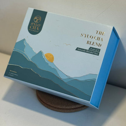 Box of 'The S'yuocha Blend' with mountain design on a white surface